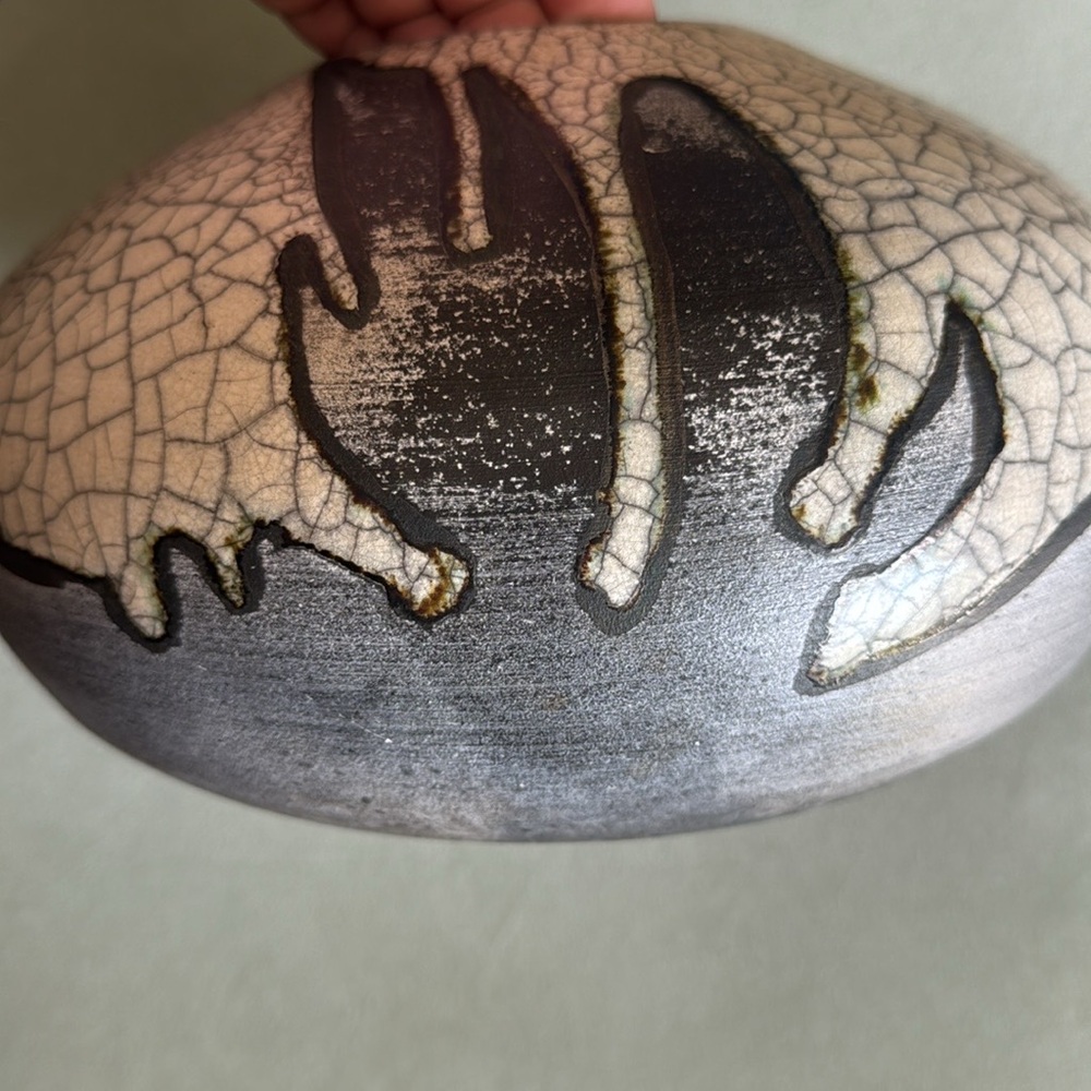 Khant Signed Studio pottery, It has a crackle glaze finish.